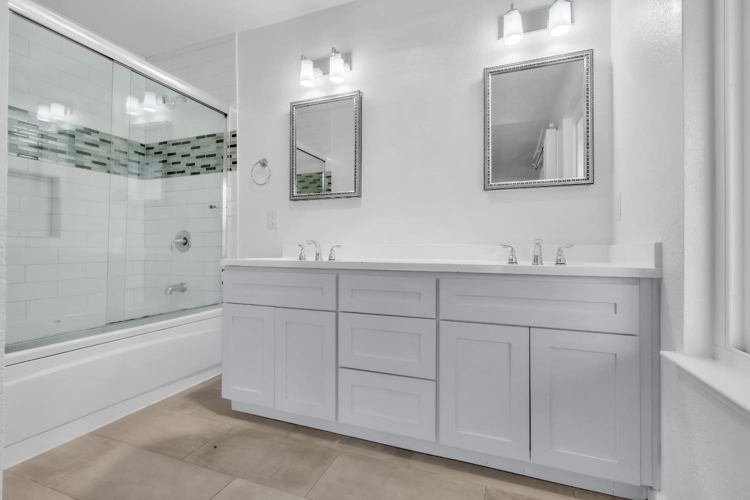 136 Rambling Drive Folsom, CA 95630 - Photo 22 of 31 a bathroom with a sink double vanity and a mirror
