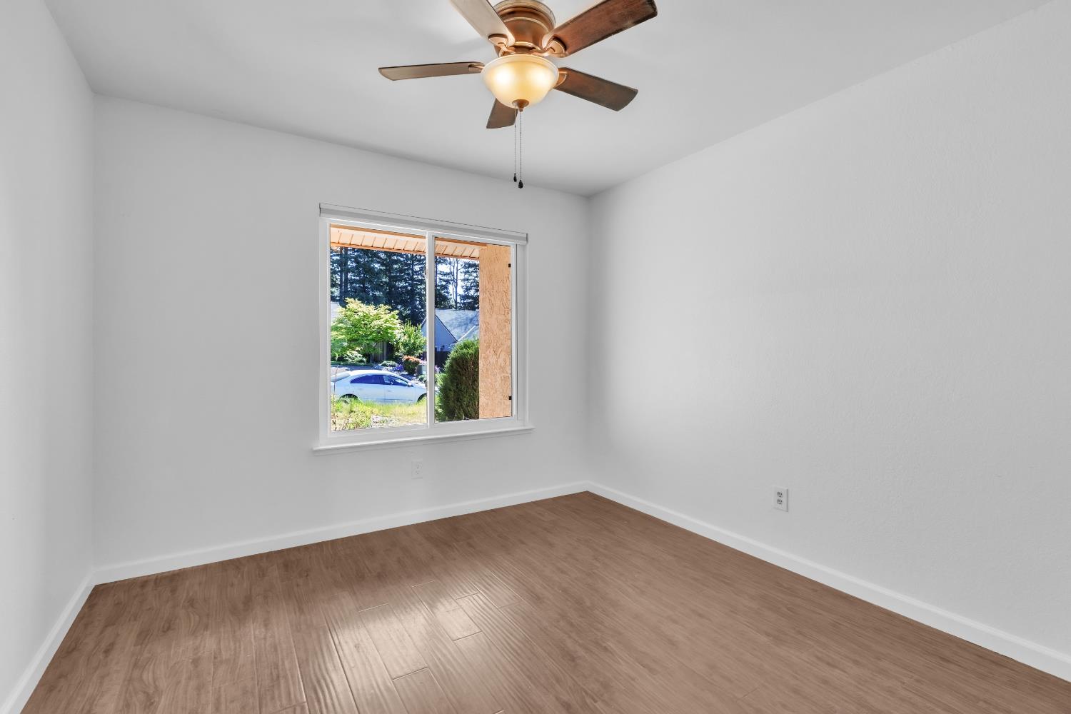 136 Rambling Drive Folsom, CA 95630 - Photo 27 of 31 an empty room with a window and a ceiling fan