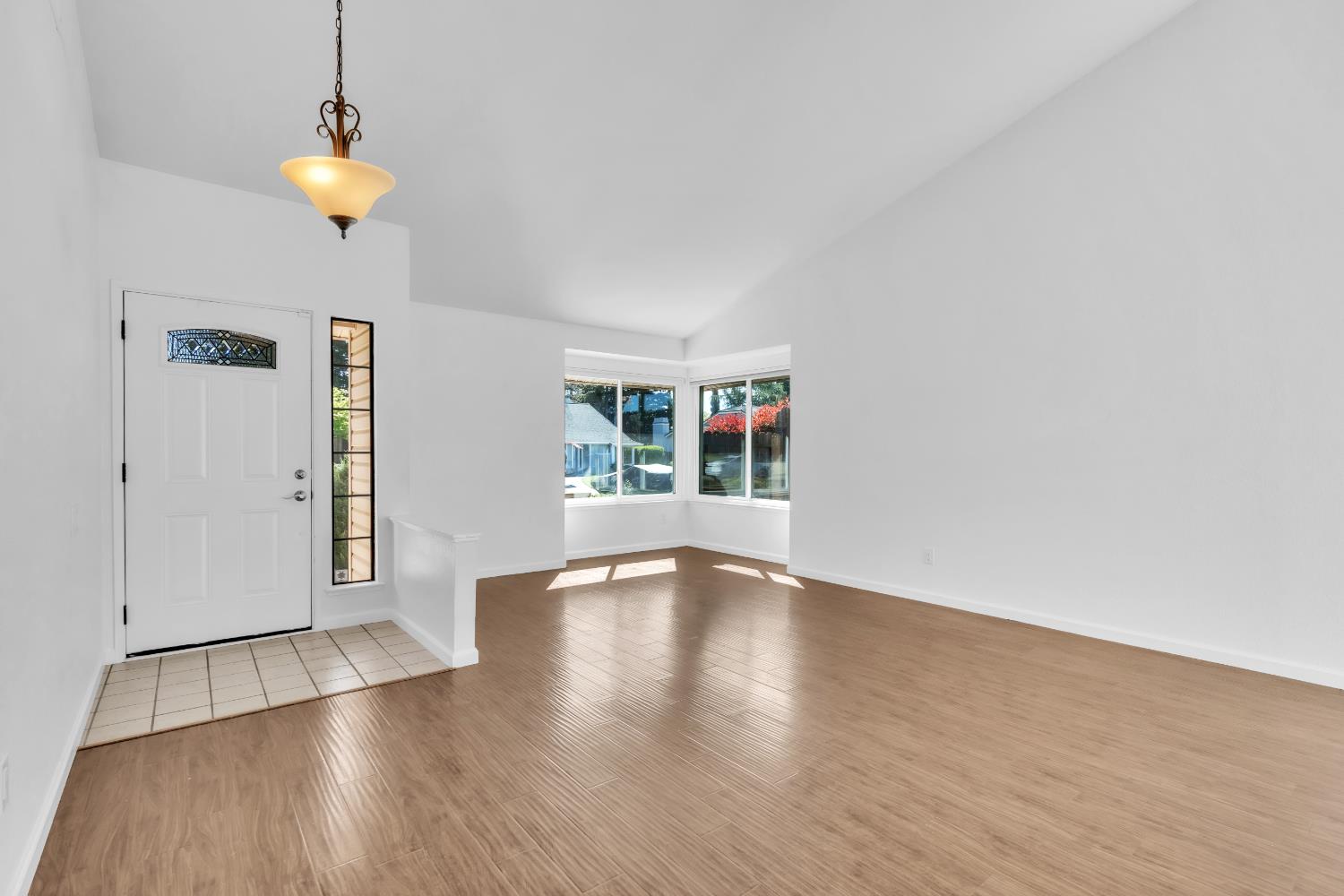 136 Rambling Drive Folsom, CA 95630 - Photo 5 of 31 a view of empty room with wooden floor