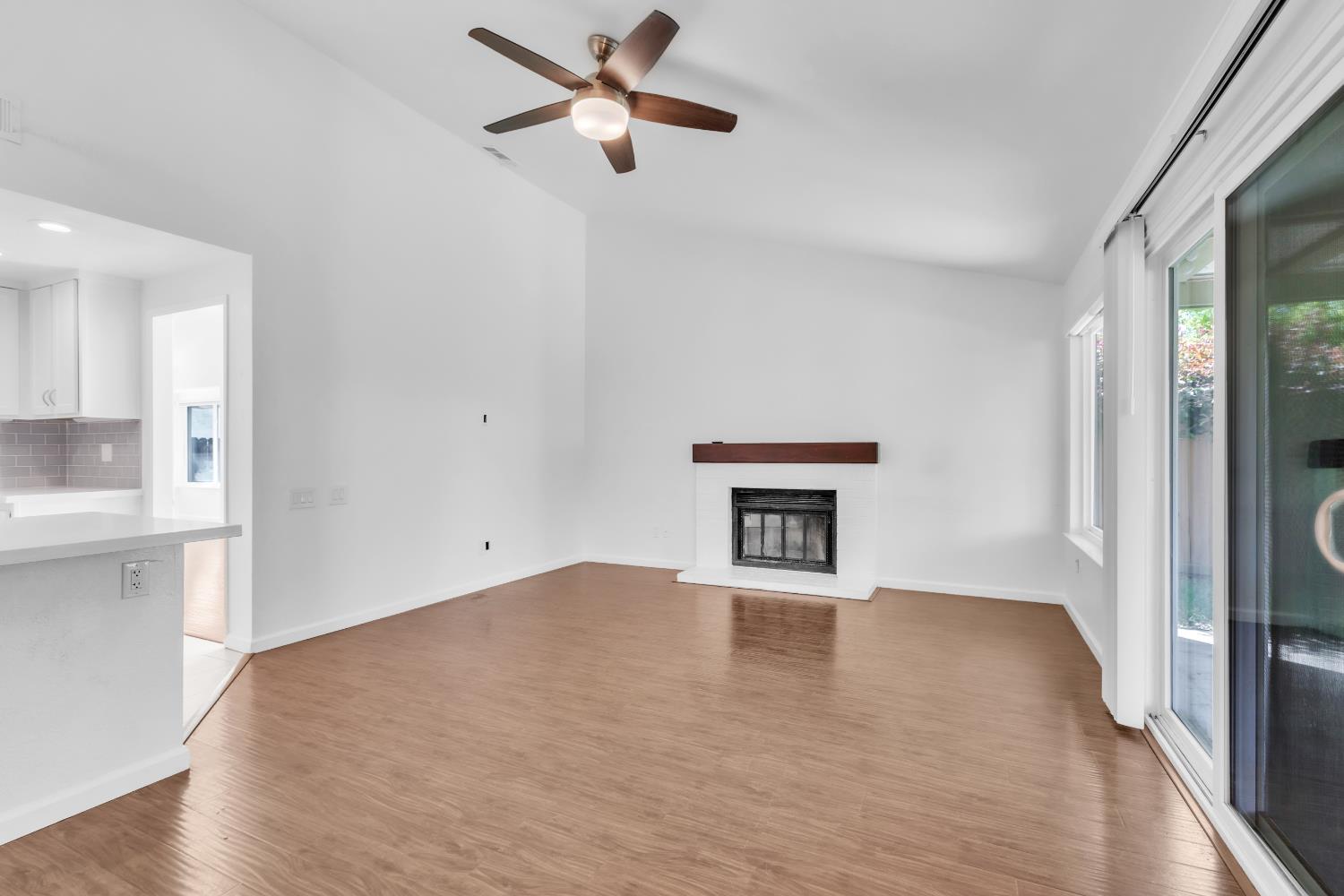 136 Rambling Drive Folsom, CA 95630 - Photo 7 of 31 wooden floor in an empty room with a window