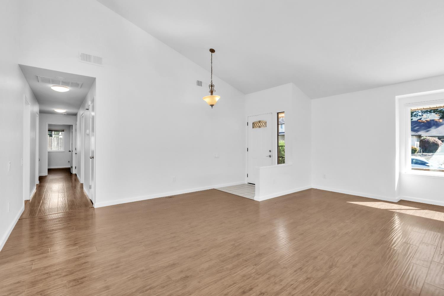 136 Rambling Drive Folsom, CA 95630 - Photo 9 of 31 a view of a livingroom with wooden floor