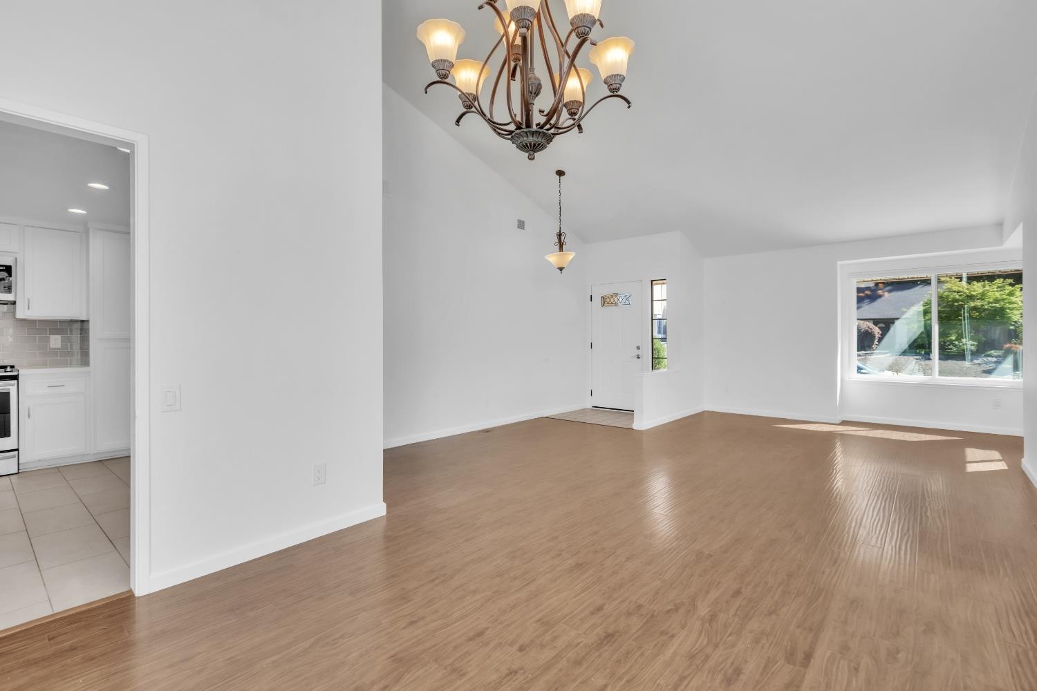 136 Rambling Drive Folsom, CA 95630 - Photo 10 of 31 a view of empty room with wooden floor