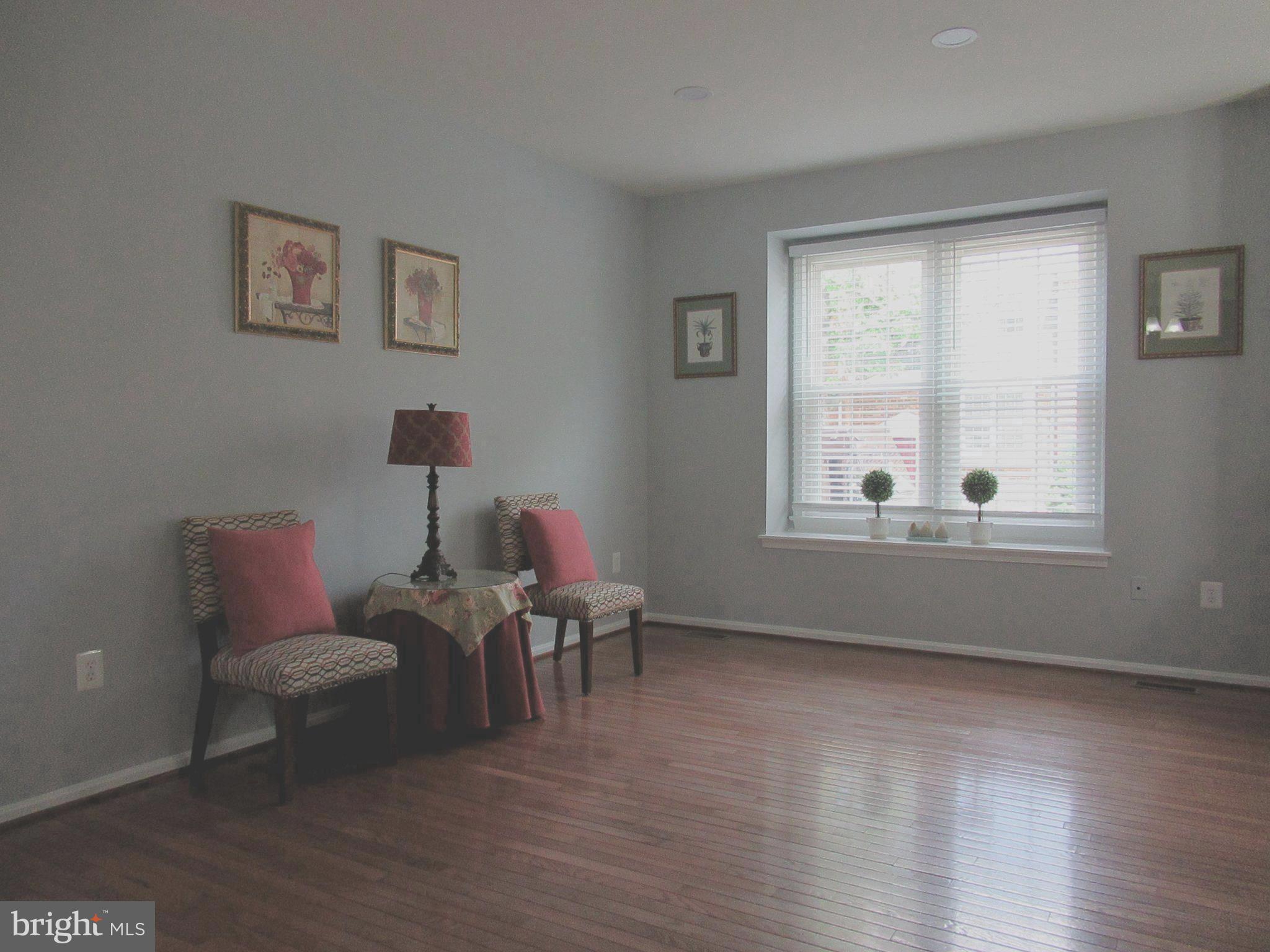 a view of a livingroom with furniture and windows