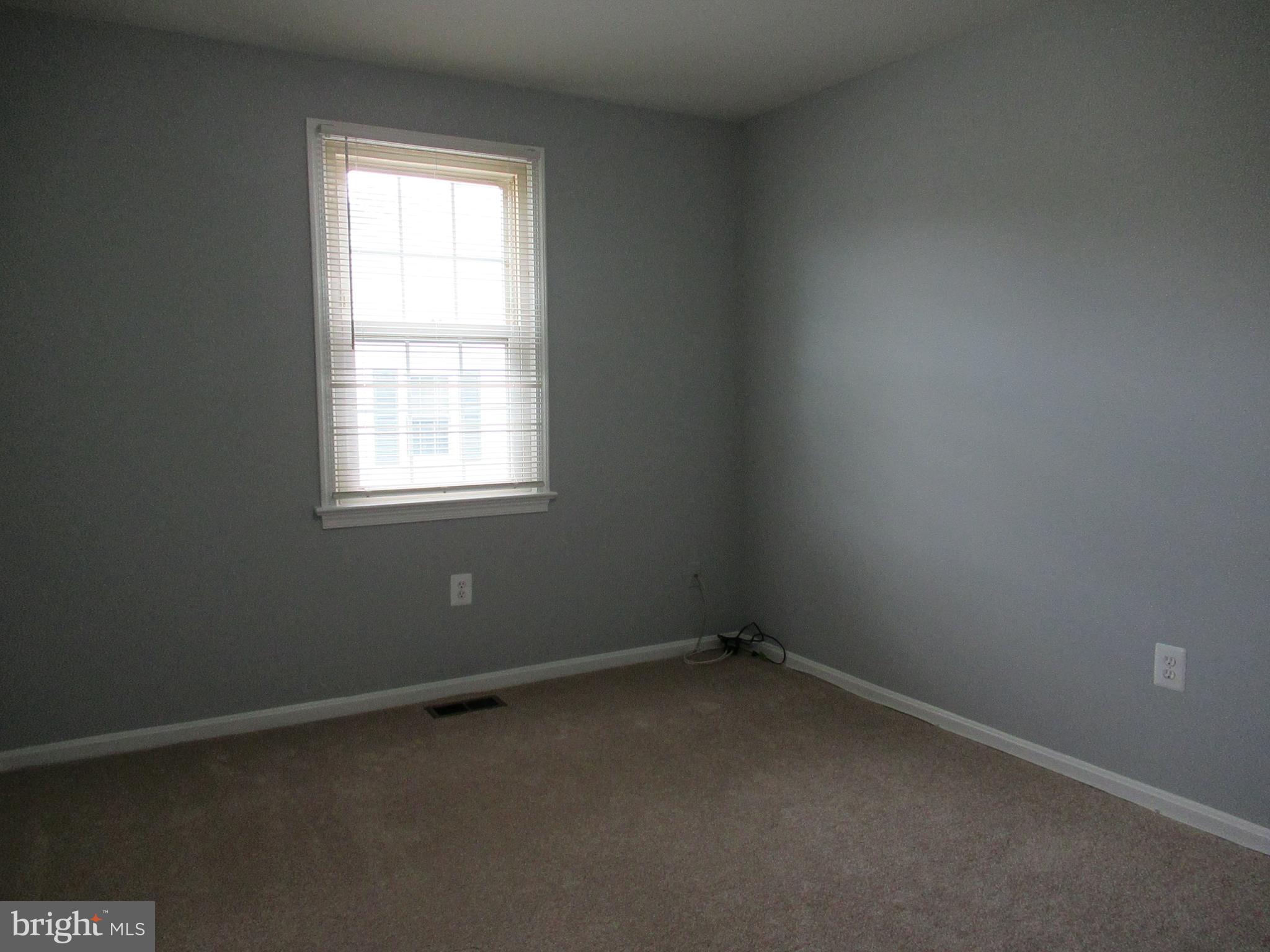 2310 Patternbond Drive Silver Spring, MD 20902 - Photo 14 of 29 an empty room with a window