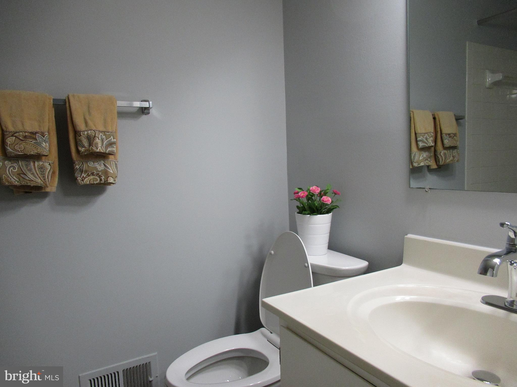 2310 Patternbond Drive Silver Spring, MD 20902 - Photo 17 of 29 a bathroom with a sink and a toilet