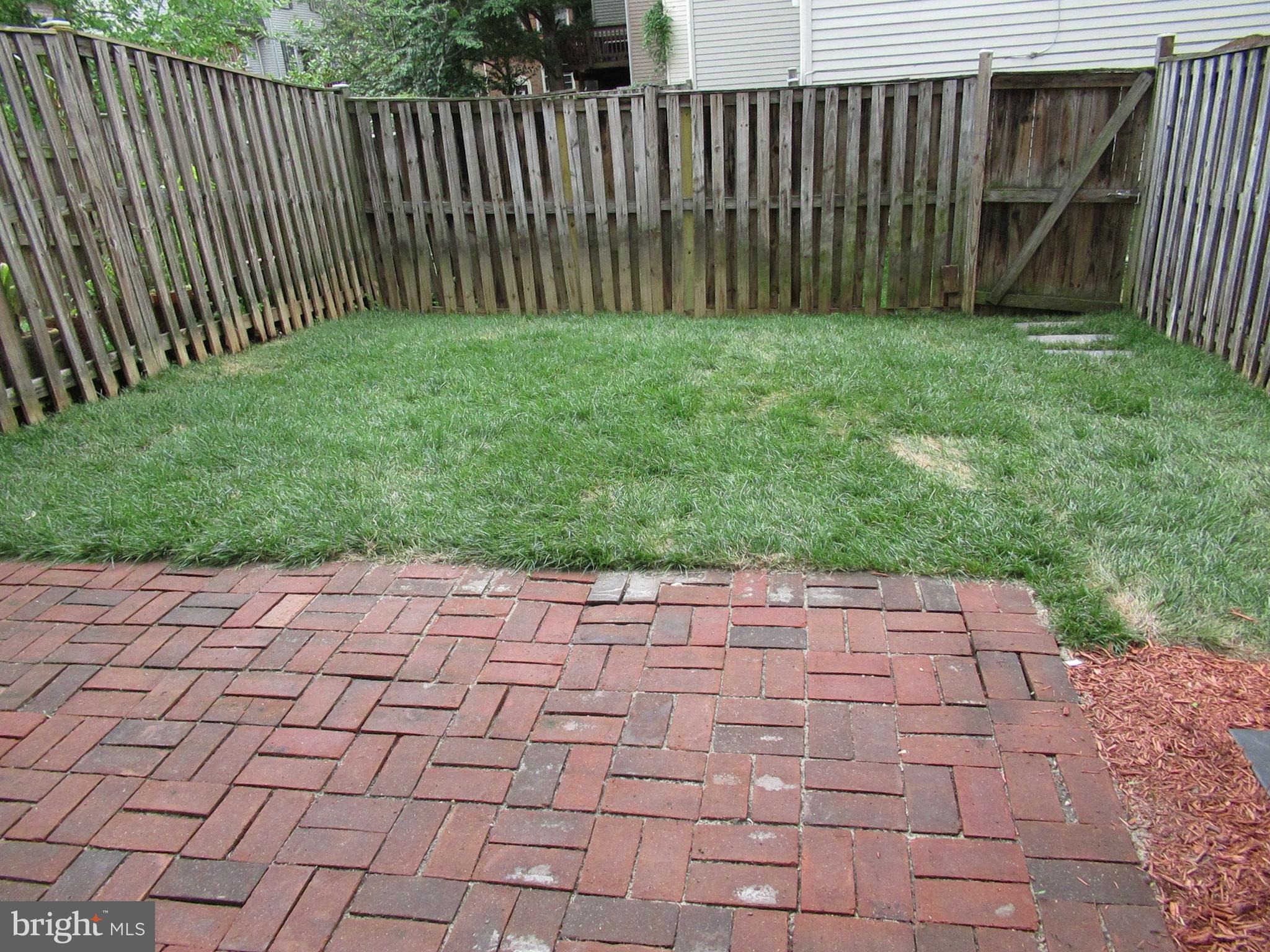 2310 Patternbond Drive Silver Spring, MD 20902 - Photo 28 of 29 a backyard of a house with lots of green space