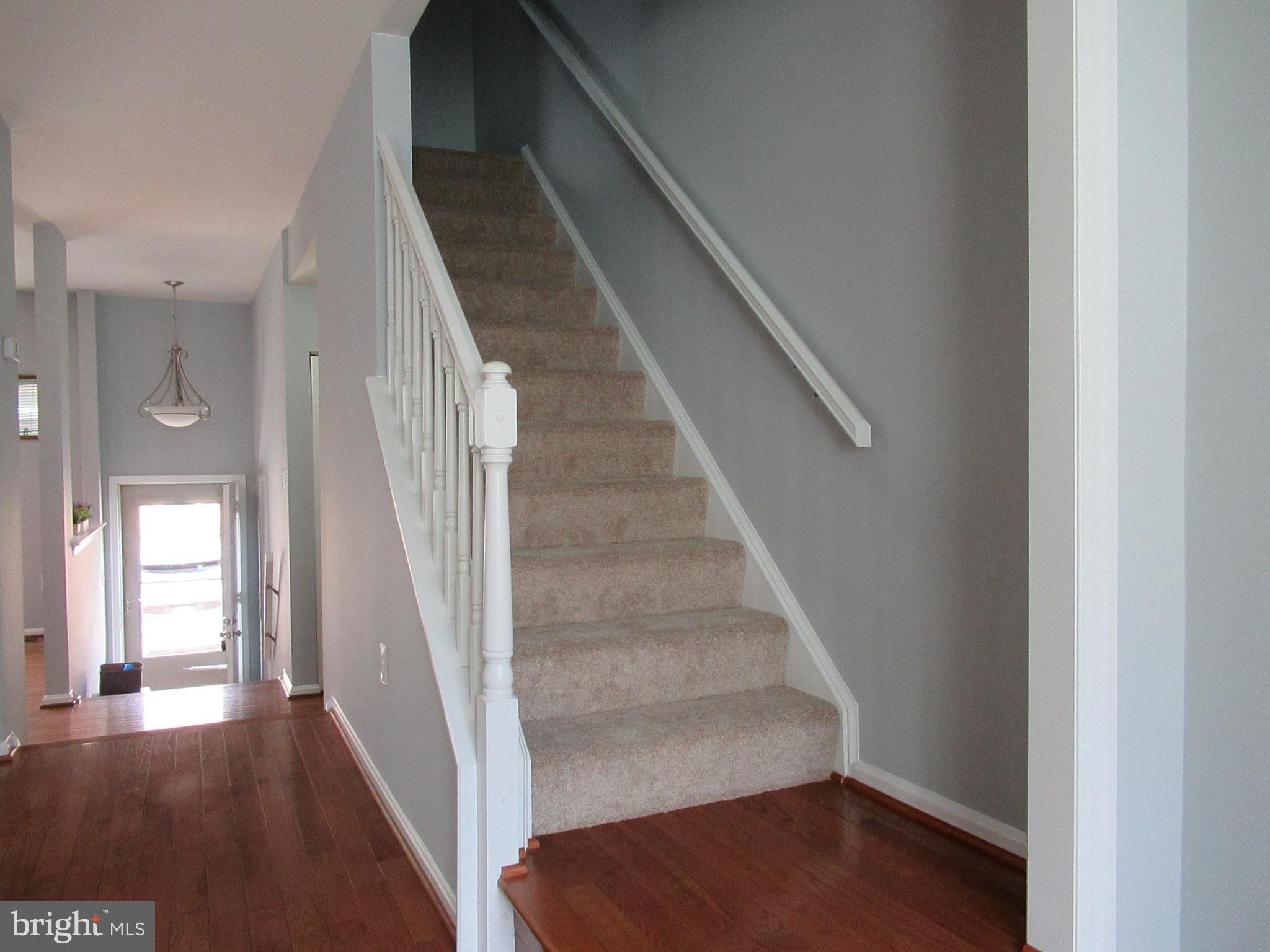 2310 Patternbond Drive Silver Spring, MD 20902 - Photo 8 of 29 a view of entryway and hall with wooden floor