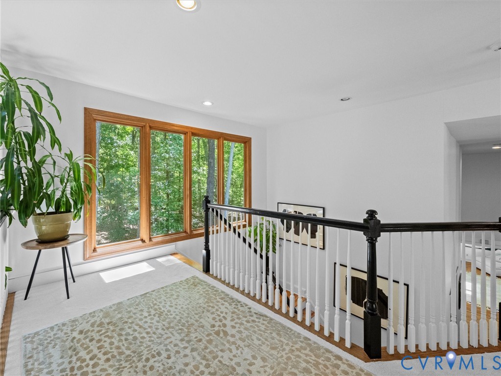 3201 St Stephens Way Midlothian, VA 23113 - Photo 51 of 72 a view of a hallway with wooden floor and stairs