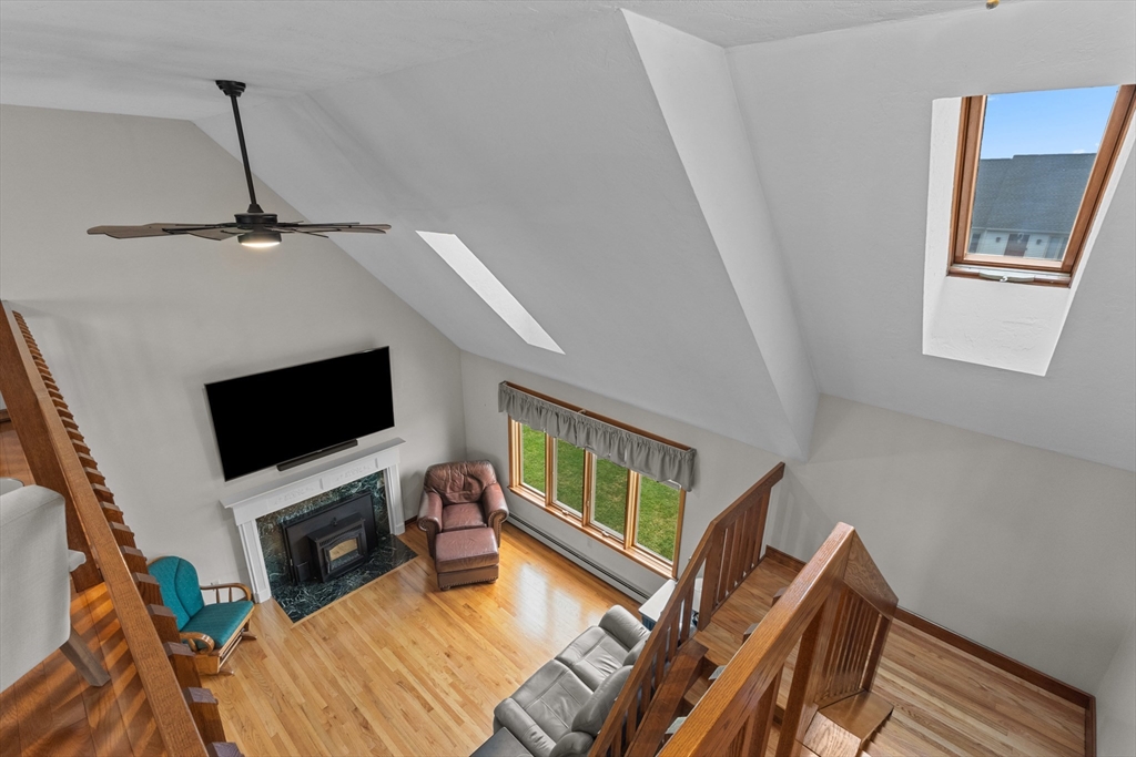 16 Flint Pond Road Worcester, MA 01604 - Photo 29 of 42 a living room with furniture and a flat screen tv