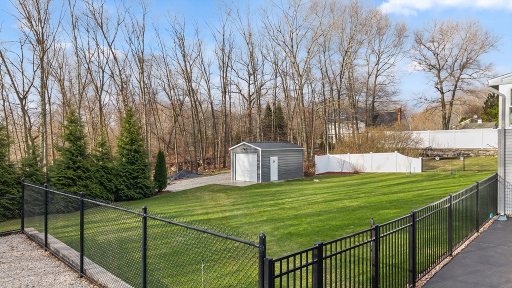 16 Flint Pond Road Worcester, MA 01604 - Photo 39 of 42 a view of a balcony with yard