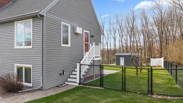 a view of a back yard of the house
