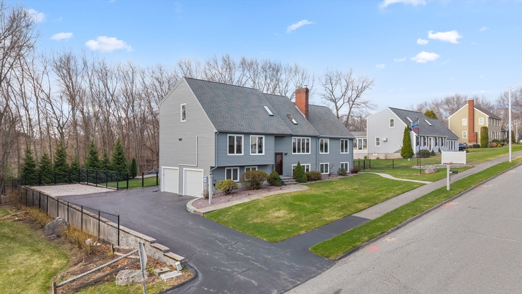 16 Flint Pond Road Worcester, MA 01604 - Photo 4 of 42 a view of a house with a yard