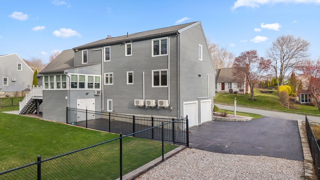 16 Flint Pond Road Worcester, MA 01604 - Photo 6 of 42 a view of a house with a yard
