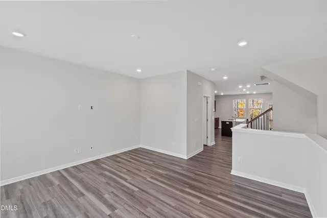 a view of a livingroom with wooden floor