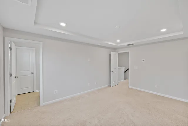 a bathroom with a sink double vanity and a mirror