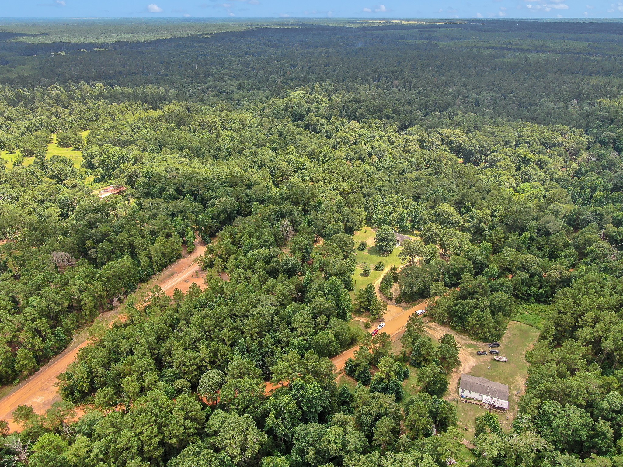 1001 Oak Ridge Road Willis, TX 77378 - Photo 2 of 14 a view of a field with an outdoor space