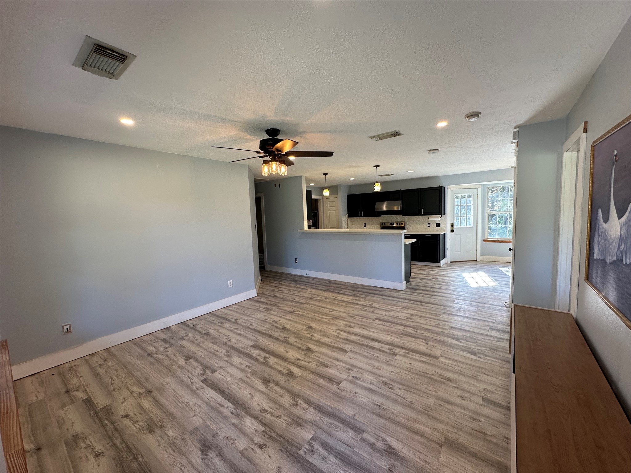 1001 Oak Ridge Road Willis, TX 77378 - Photo 8 of 14 a view of kitchen and natural light