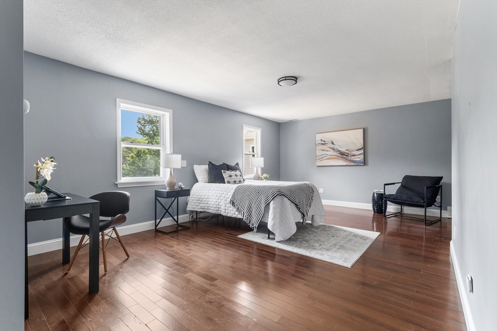 23 East Windsor Road Worthington, MA 01098 - Photo 22 of 40 a bedroom with a bed and a table