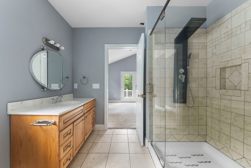 23 East Windsor Road Worthington, MA 01098 - Photo 23 of 40 a bathroom with a sink a toilet and shower