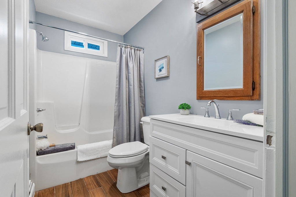 23 East Windsor Road Worthington, MA 01098 - Photo 28 of 40 a bathroom with a sink a toilet and shower