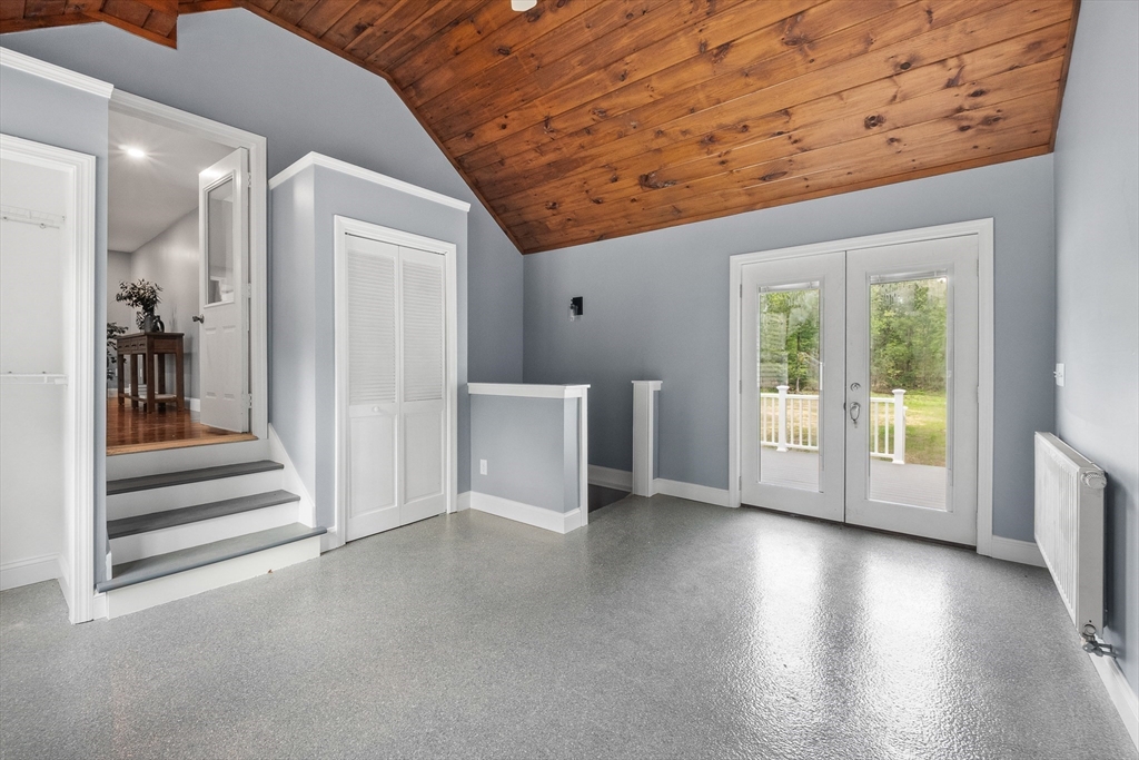 23 East Windsor Road Worthington, MA 01098 - Photo 29 of 40 a view of a livingroom with wooden floor and a window