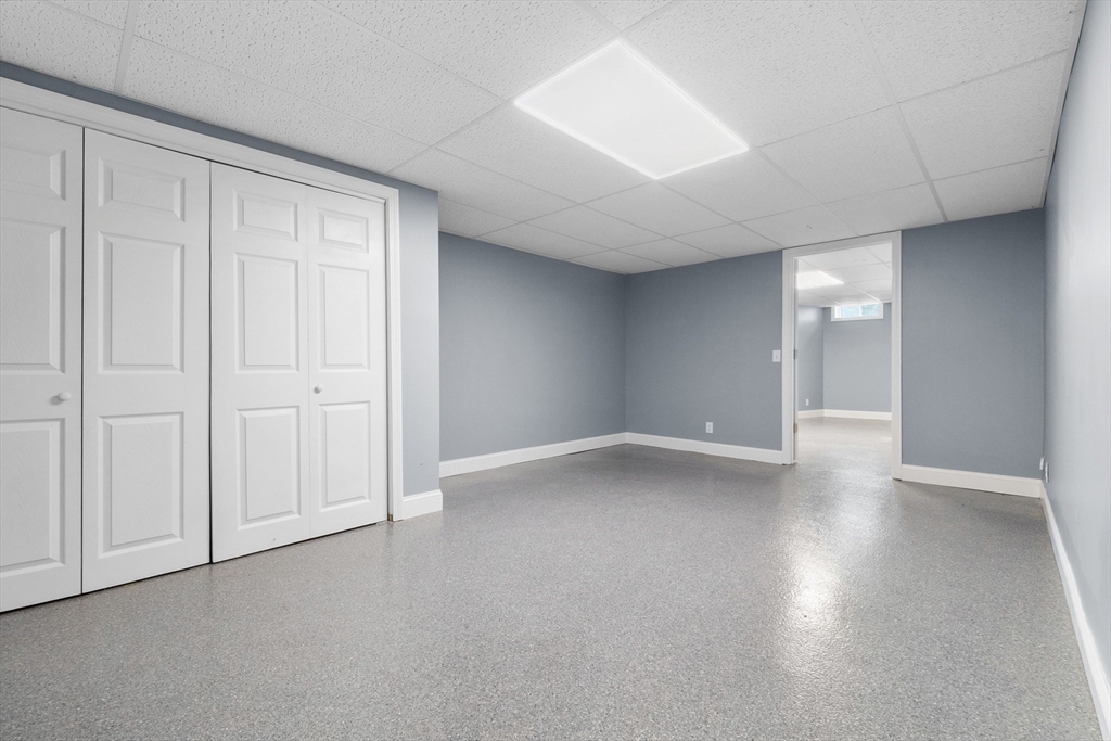 23 East Windsor Road Worthington, MA 01098 - Photo 32 of 40 an empty room with wooden floor and windows