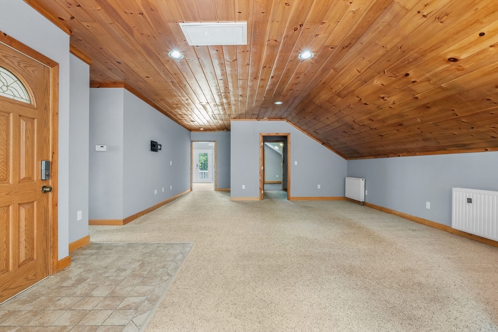 23 East Windsor Road Worthington, MA 01098 - Photo 33 of 40 a view of empty room with windows