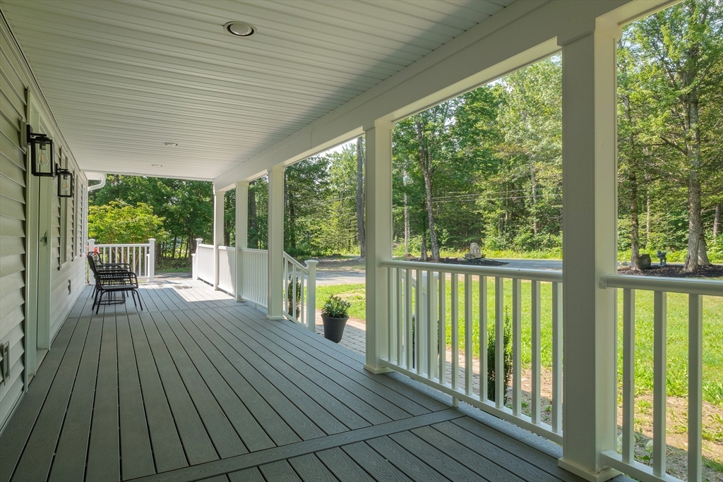 23 East Windsor Road Worthington, MA 01098 - Photo 4 of 40 a view of balcony with wooden floor
