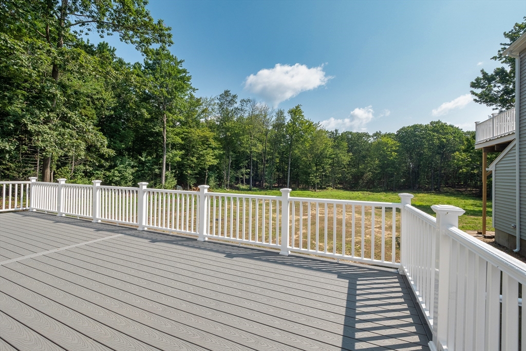 23 East Windsor Road Worthington, MA 01098 - Photo 7 of 40 a view of a deck with a trees