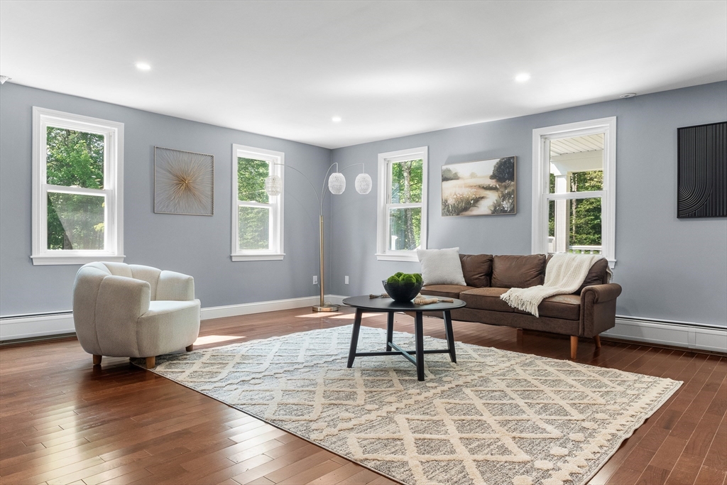 23 East Windsor Road Worthington, MA 01098 - Photo 9 of 40 a living room with furniture and a window