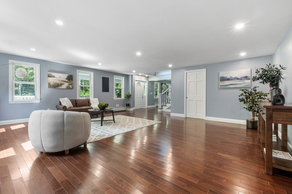 23 East Windsor Road Worthington, MA 01098 - Photo 10 of 40 a living room with furniture and a wooden floor