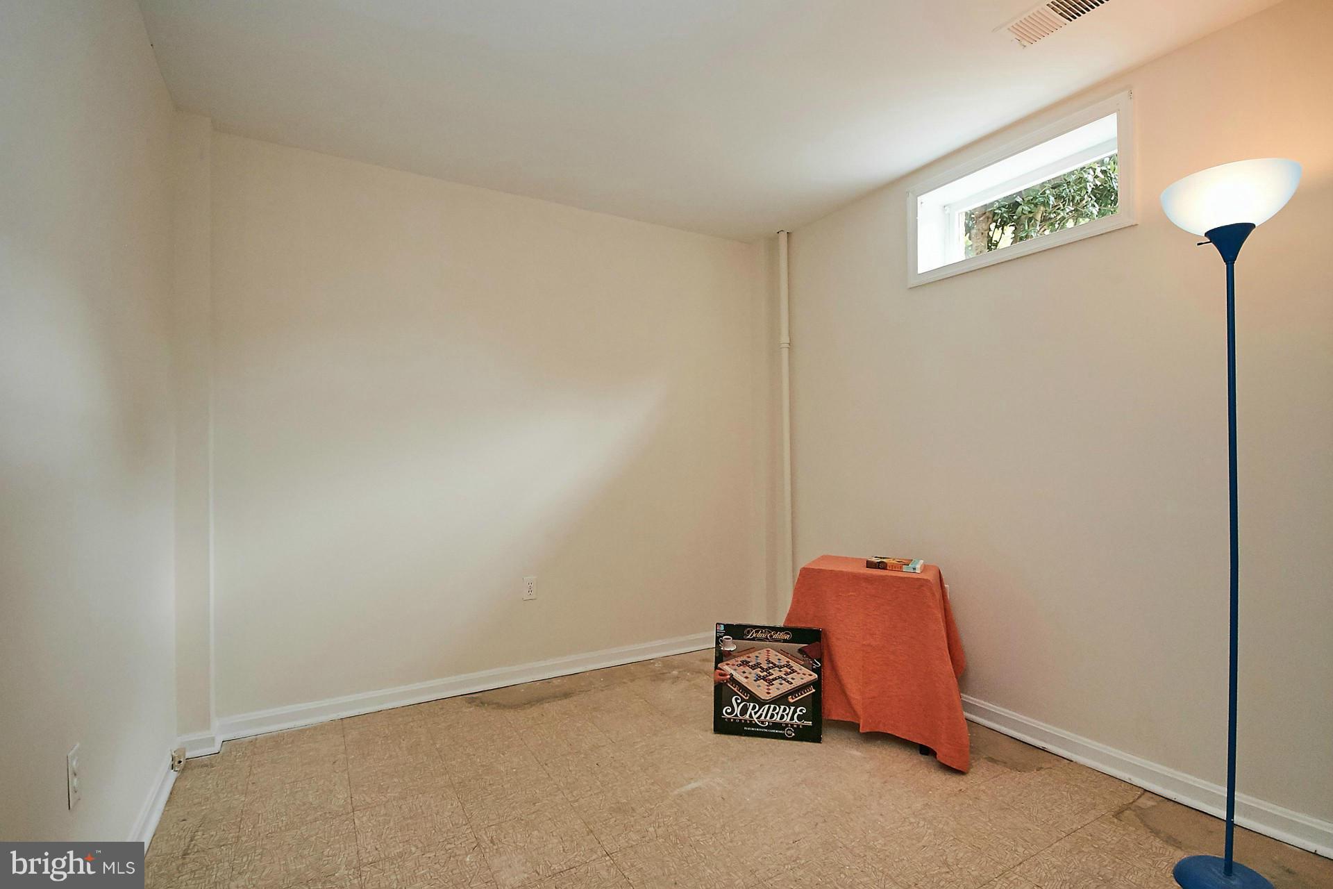 5264 Leestone Court Springfield, VA 22151 - Photo 24 of 30 a room with a water heater and a table