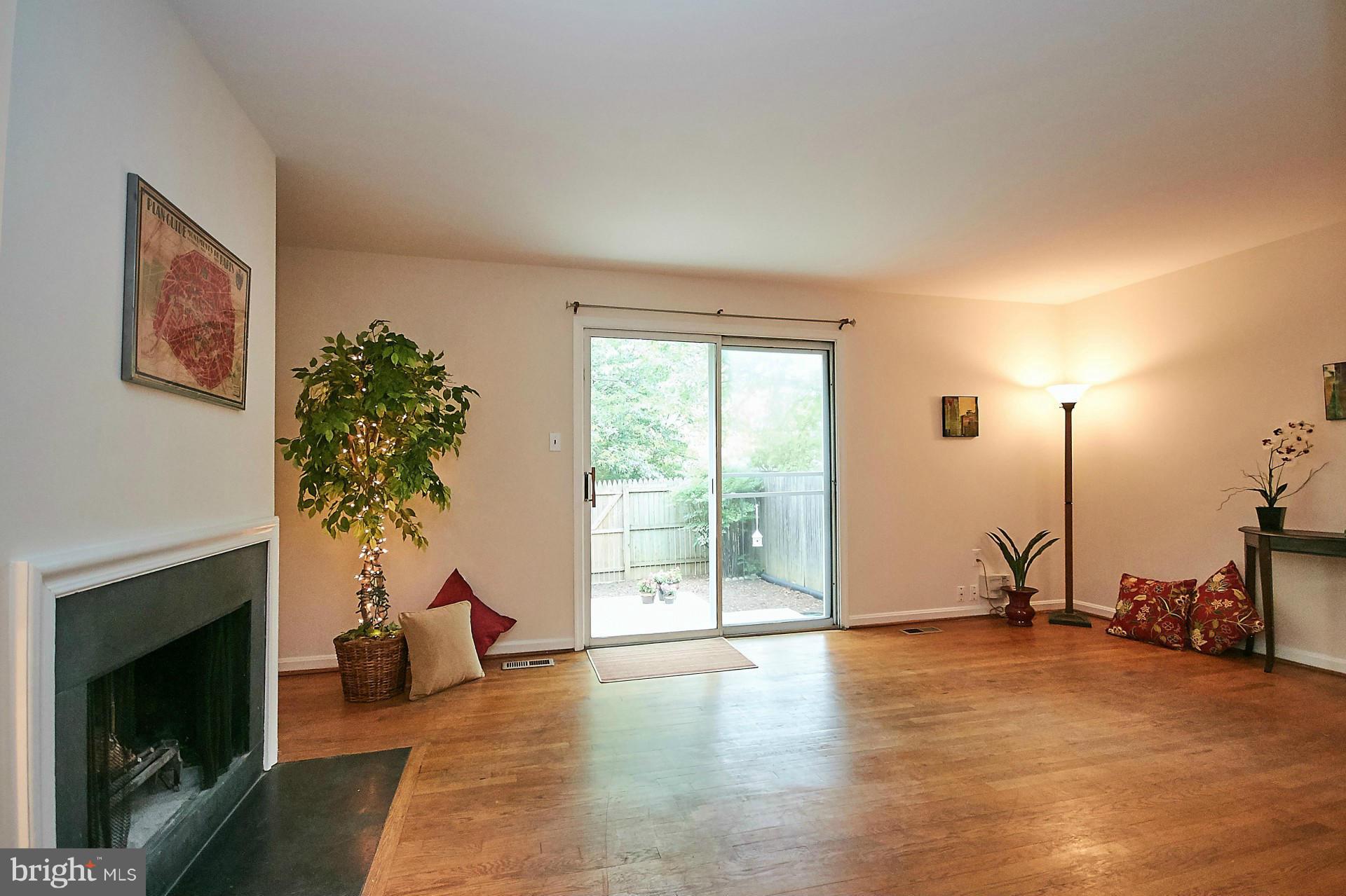 5264 Leestone Court Springfield, VA 22151 - Photo 5 of 30 a living room with furniture window and a fireplace