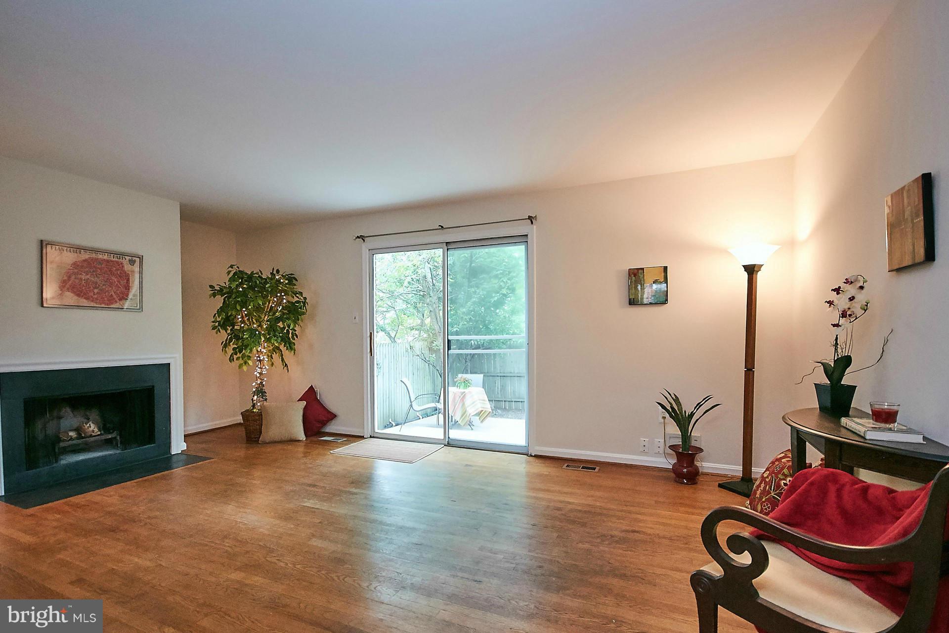 5264 Leestone Court Springfield, VA 22151 - Photo 6 of 30 a view of a livingroom with furniture and a fireplace