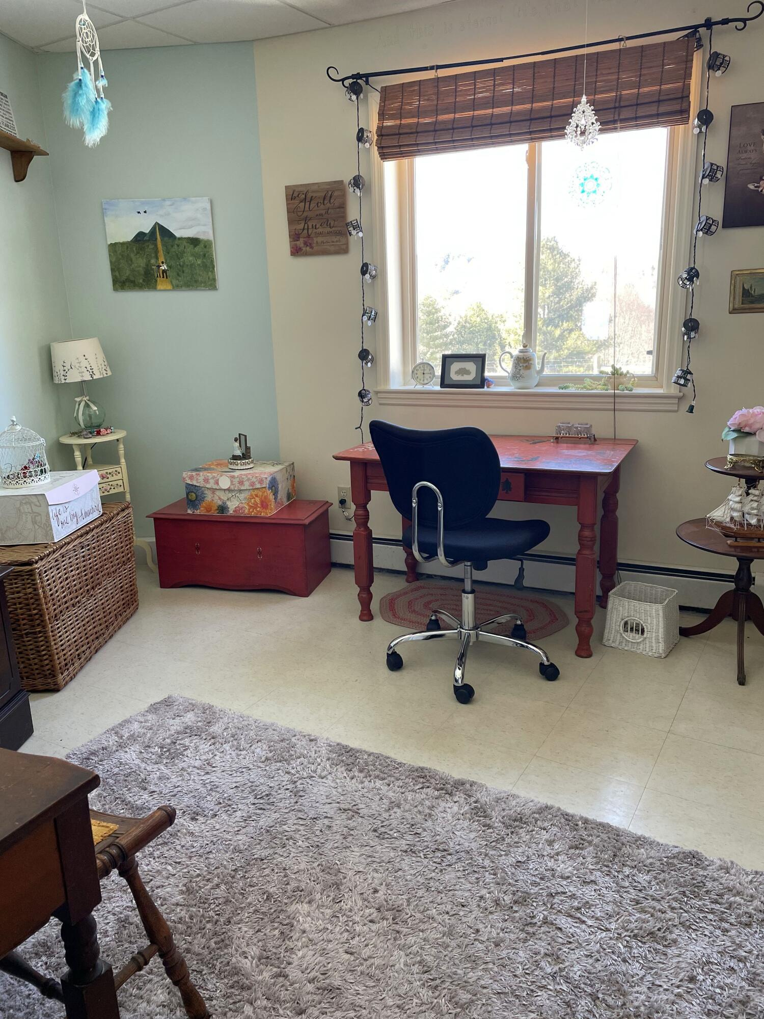 242 Sterling Bridge Road Northwest Willis, VA 24380 - Photo 18 of 32 a workspace with furniture and a window