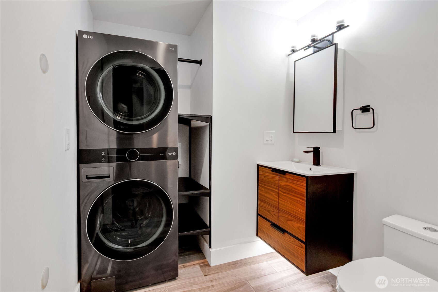 9013 Prentice Avenue Gig Harbor, WA 98332 - Photo 14 of 16 a bathroom with a toilet and a sink
