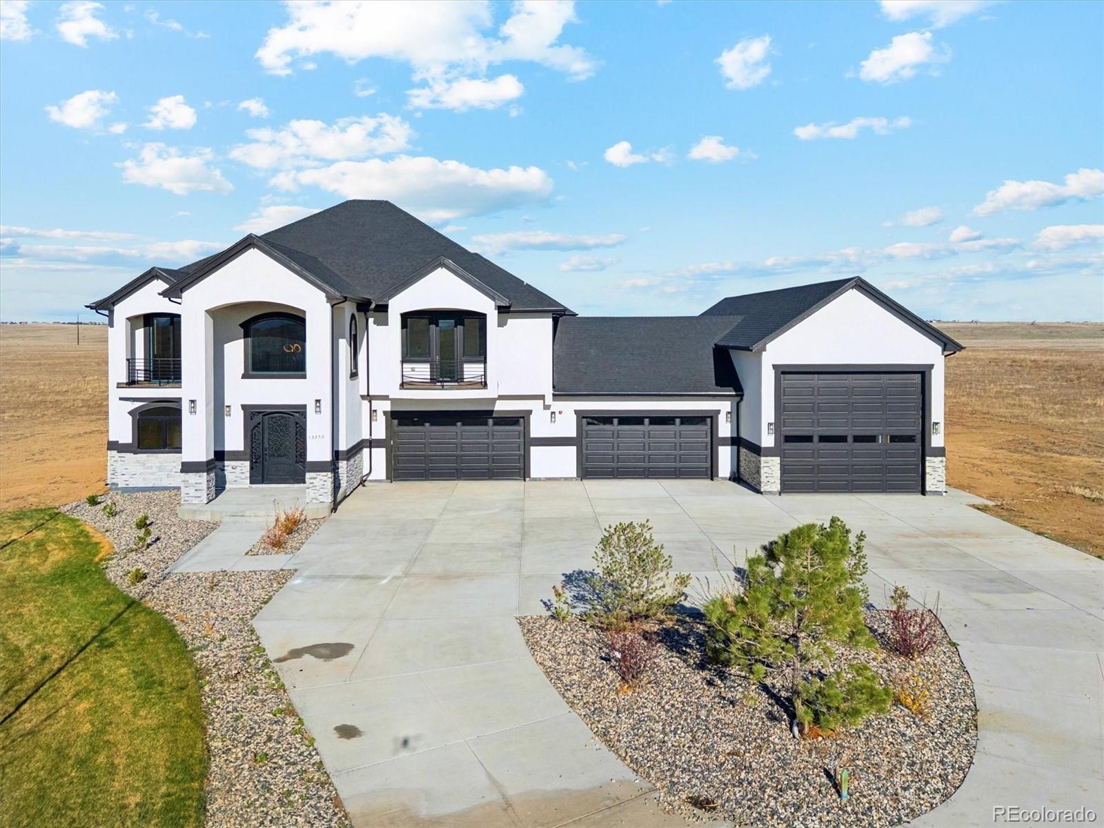 13350 Imboden Road Hudson, CO 80642 - Photo 43 of 50 a front view of a house with a yard