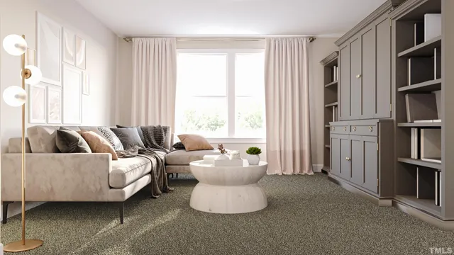 a bedroom with a bed and a potted plant