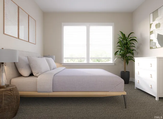 a living room with furniture a air conditioner and a window