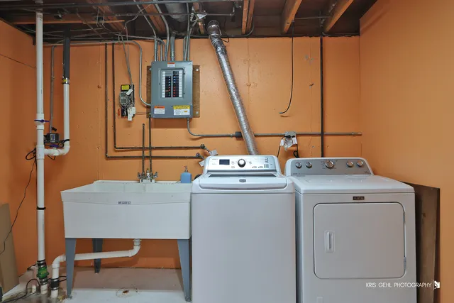 a utility room with dryer and washer