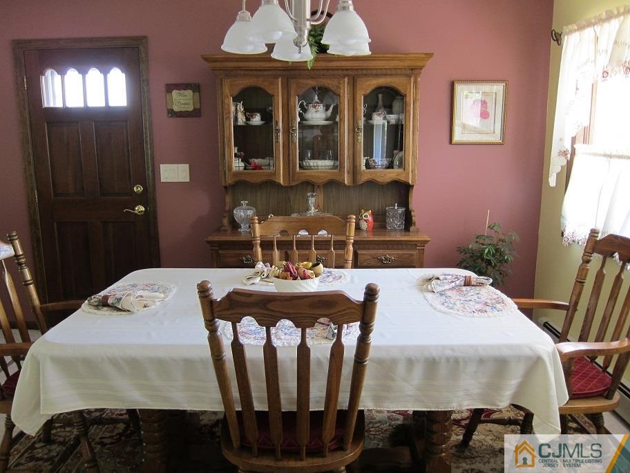 41 Colton Road Edison, NJ 08817 - Photo 5 of 16 a dining room with furniture and window