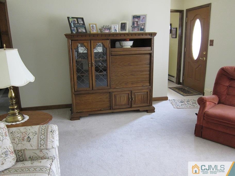 41 Colton Road Edison, NJ 08817 - Photo 7 of 16 a living room with furniture and a wooden floor