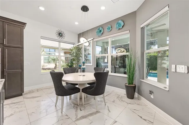 a bathroom with a double vanity sink mirror and shower