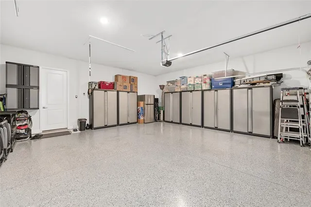 a view of swimming pool with a patio