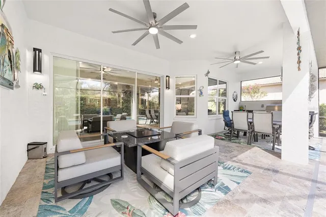 a front view of a house with a garden and plants