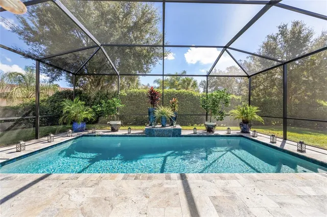 an aerial view of a house with a ocean view