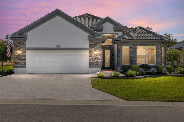 a view of a hallway with windows
