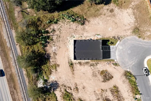 a view of a backyard of the house