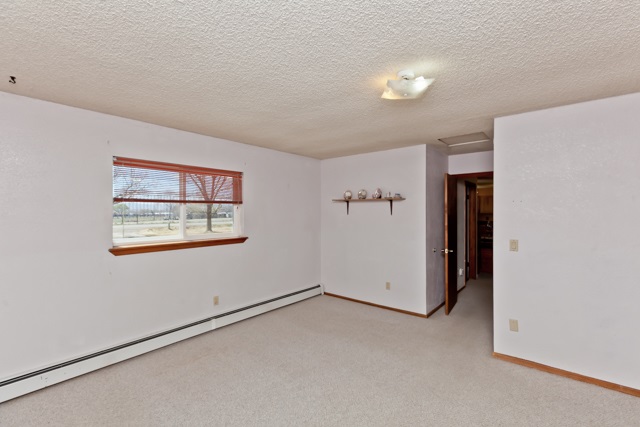 3464 G Road Clifton, CO 81520 - Photo 21 of 42 an empty room with windows