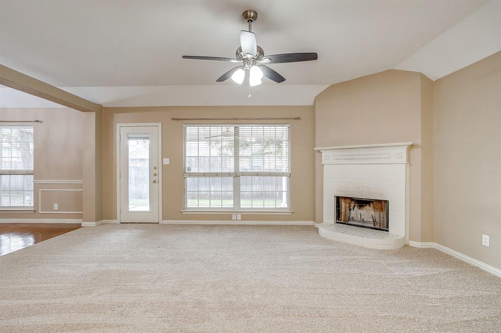 177 Aspen Loop Aledo, TX 76008 - Photo 15 of 40 a view of an empty room with window and fire place